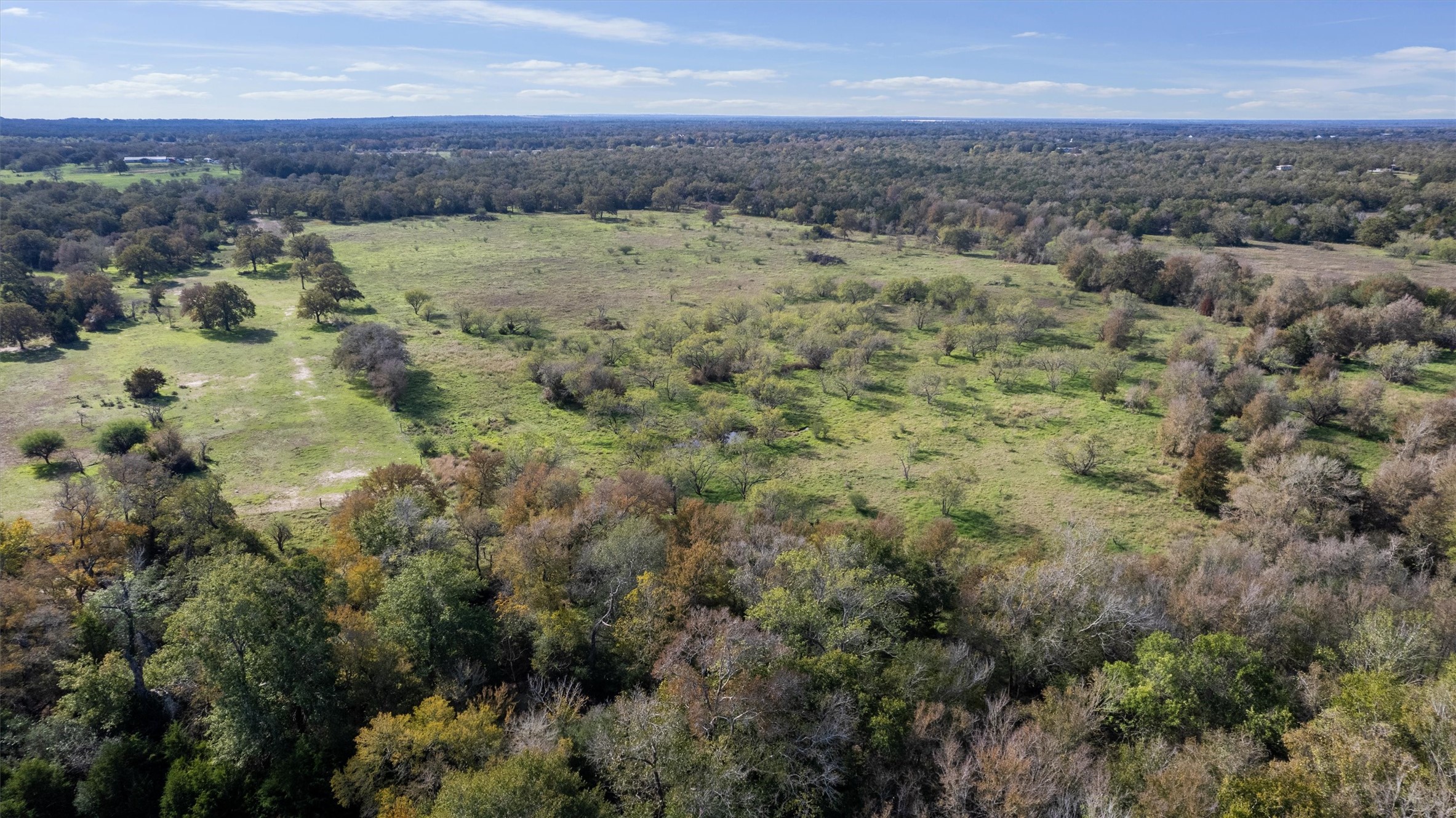 221 Old Waelder Road Flatonia, TX 78941 - Photo 7 of 27 an aerial view of residential houses with outdoor space