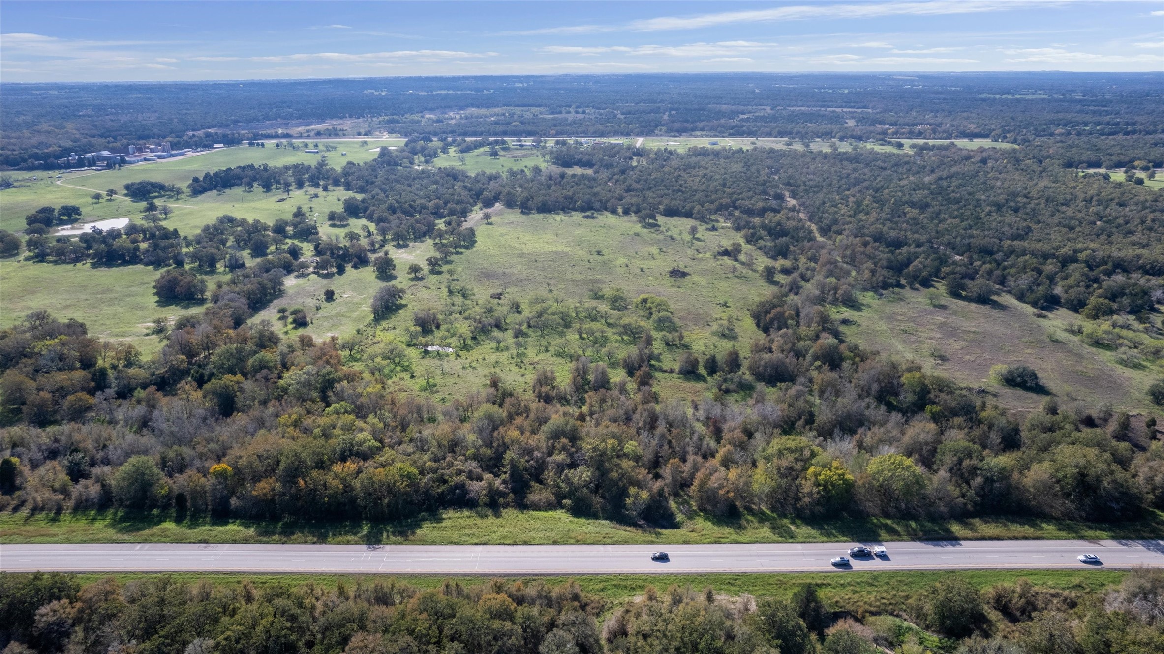 221 Old Waelder Road Flatonia, TX 78941 - Photo 9 of 27 a view of a yard with a garden