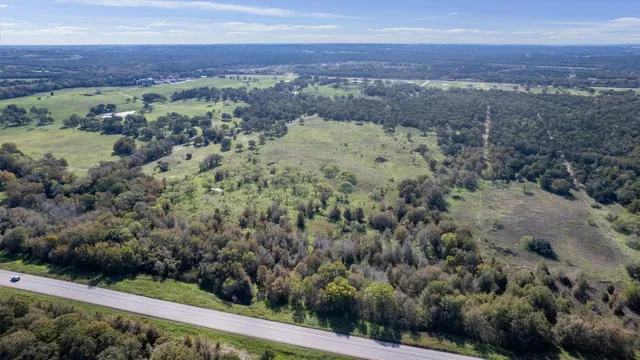 a view of mountain view with lots of trees