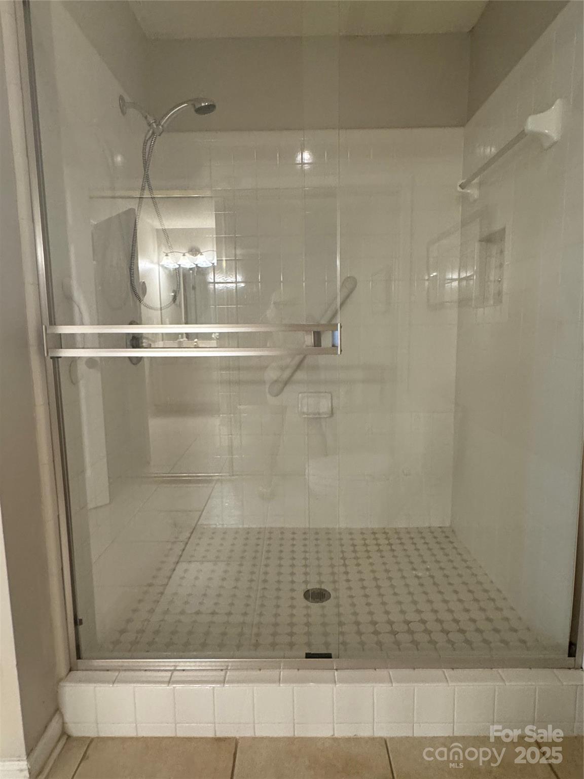 21120 Cold Spring Lane Cornelius, NC 28031 - Photo 15 of 22 a bathroom with a shower