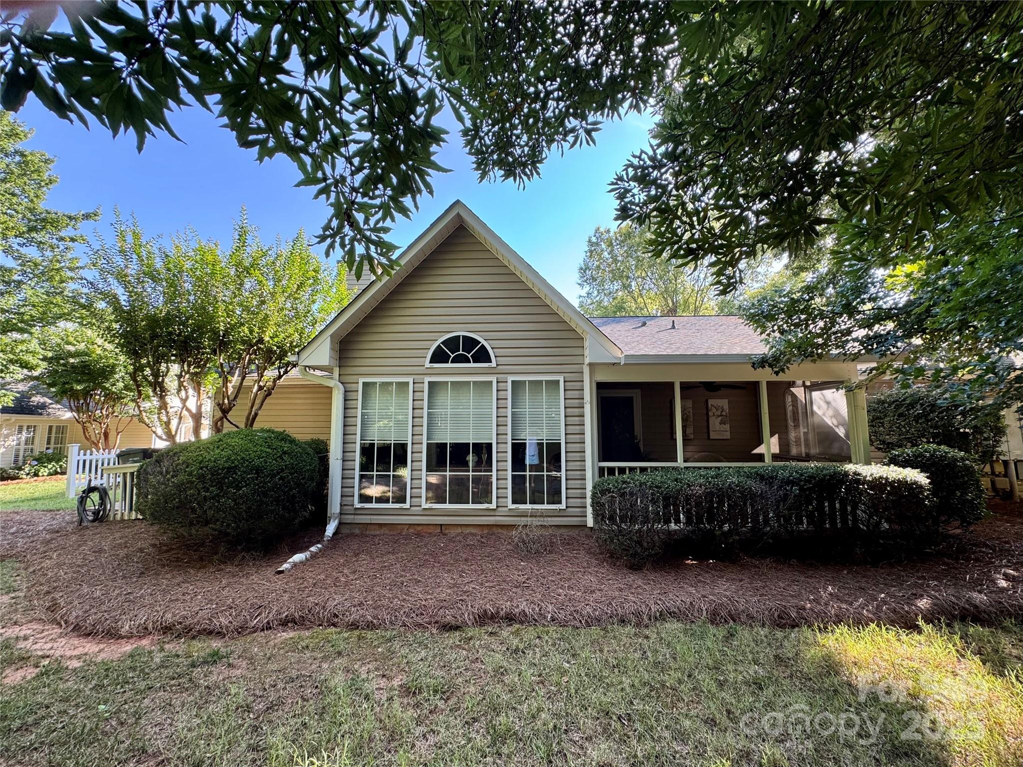 21120 Cold Spring Lane Cornelius, NC 28031 - Photo 22 of 22 a front view of a house with garden