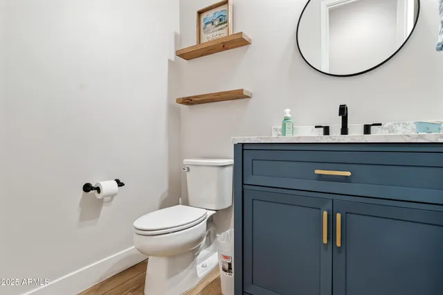 a living room with furniture a window and a table