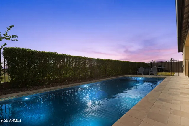 an aerial view of a house with a ocean view