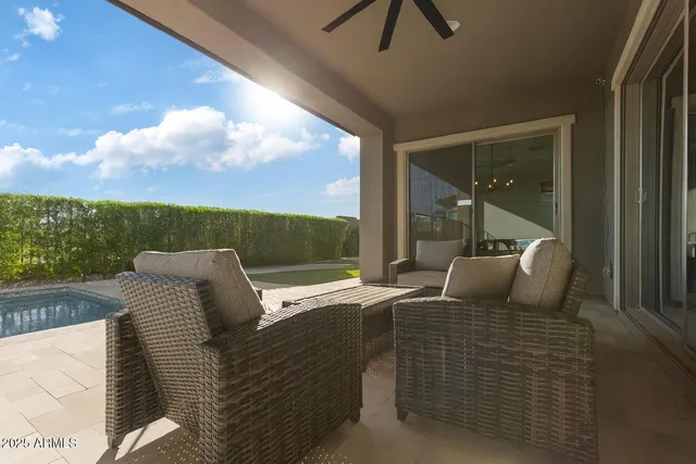 a view of a lake in the middle of a yard