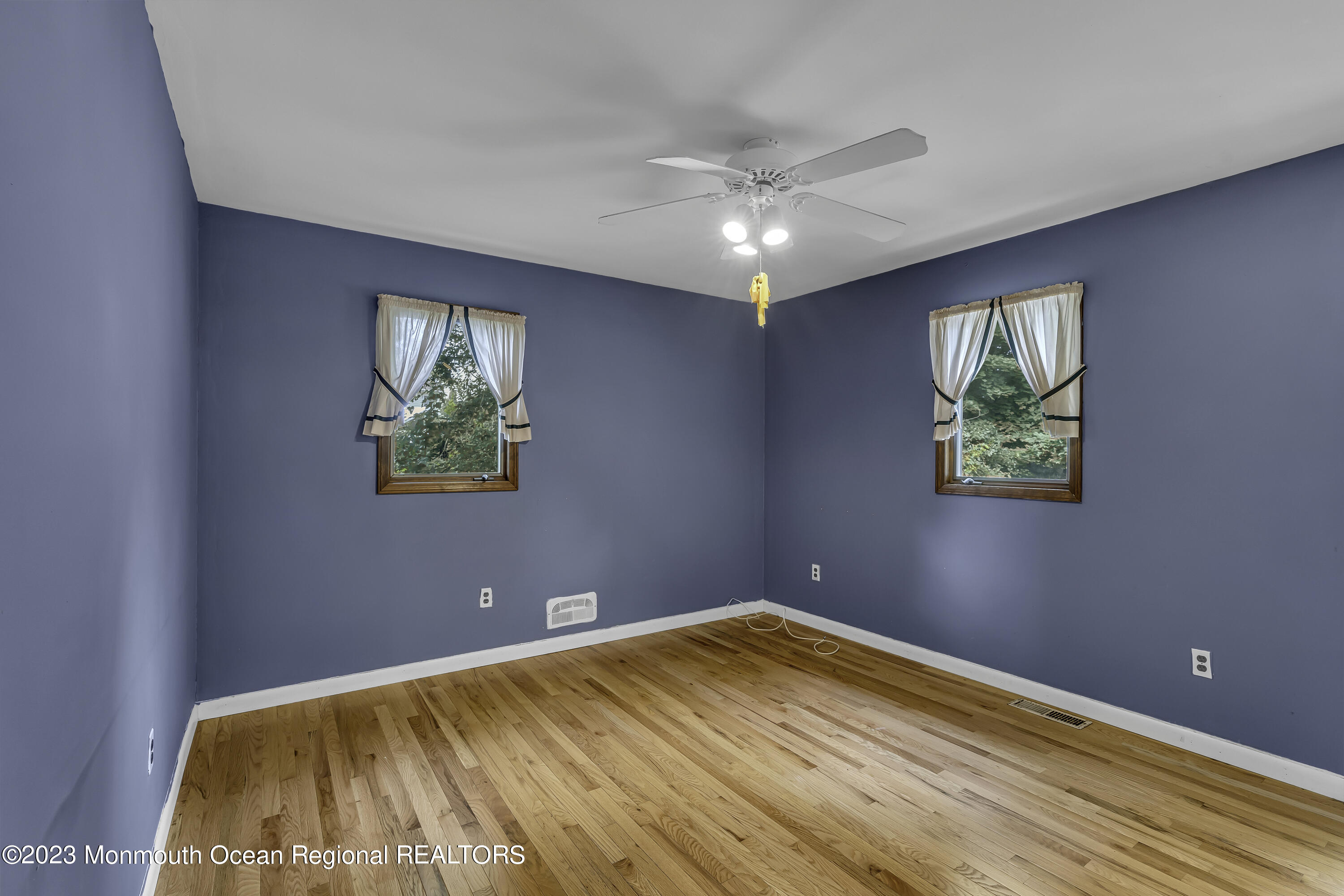388 Cherry Quay Road Brick, NJ 08723 - Photo 15 of 35 a view of empty room with window and ceiling fan
