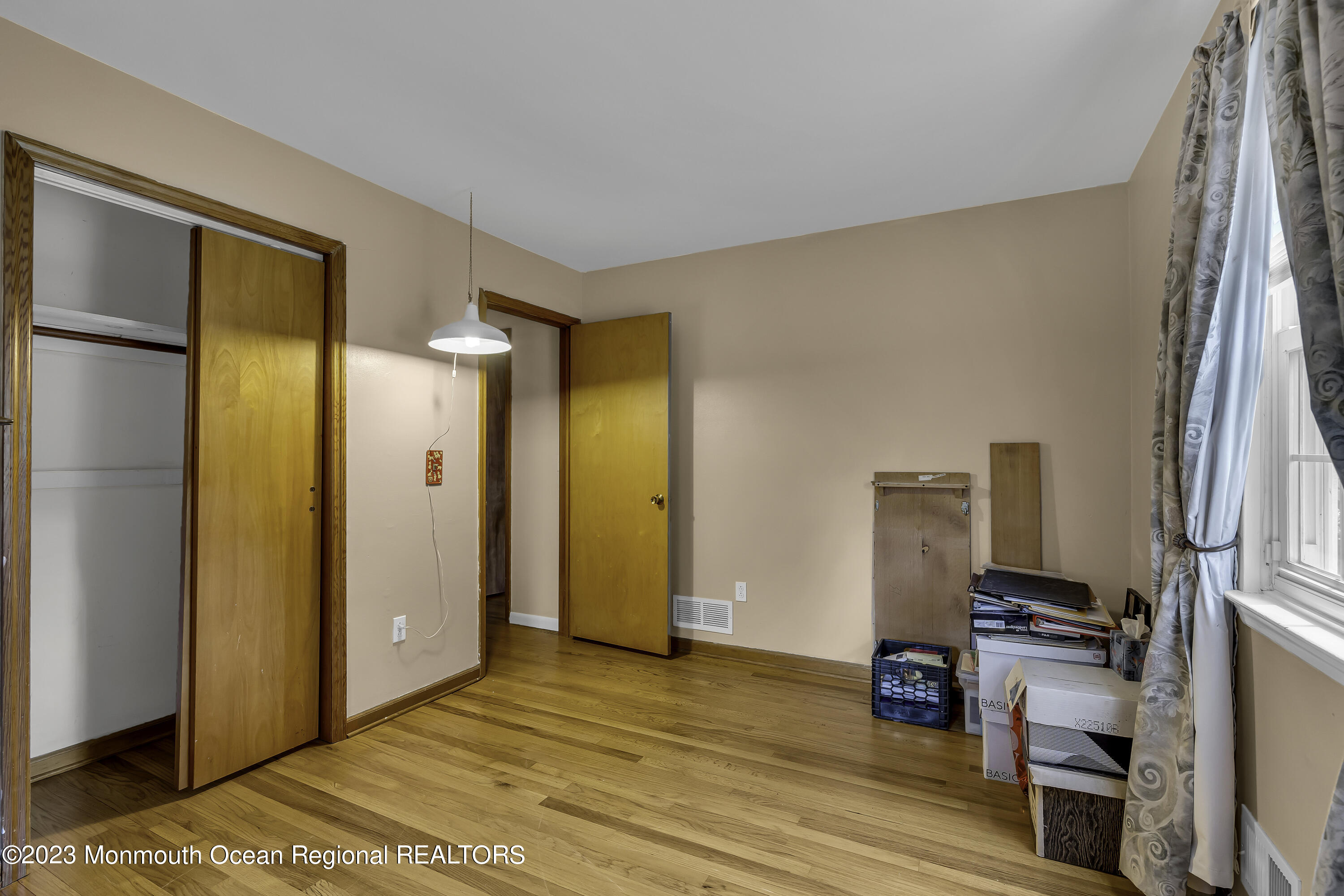 388 Cherry Quay Road Brick, NJ 08723 - Photo 24 of 35 a view of a room with furniture and wooden floor