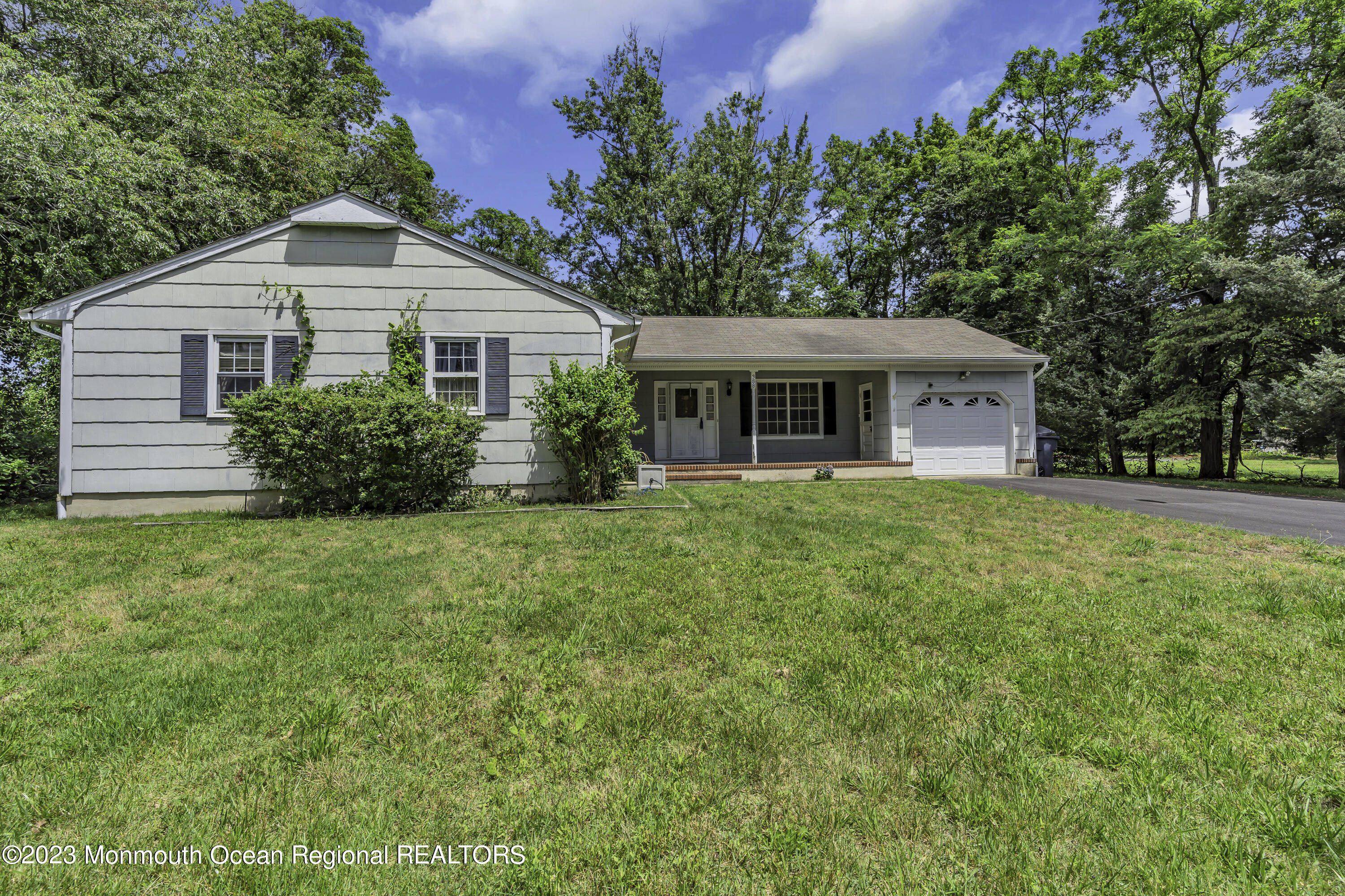 388 Cherry Quay Road Brick, NJ 08723 - Photo 27 of 35 a front view of a house with garden