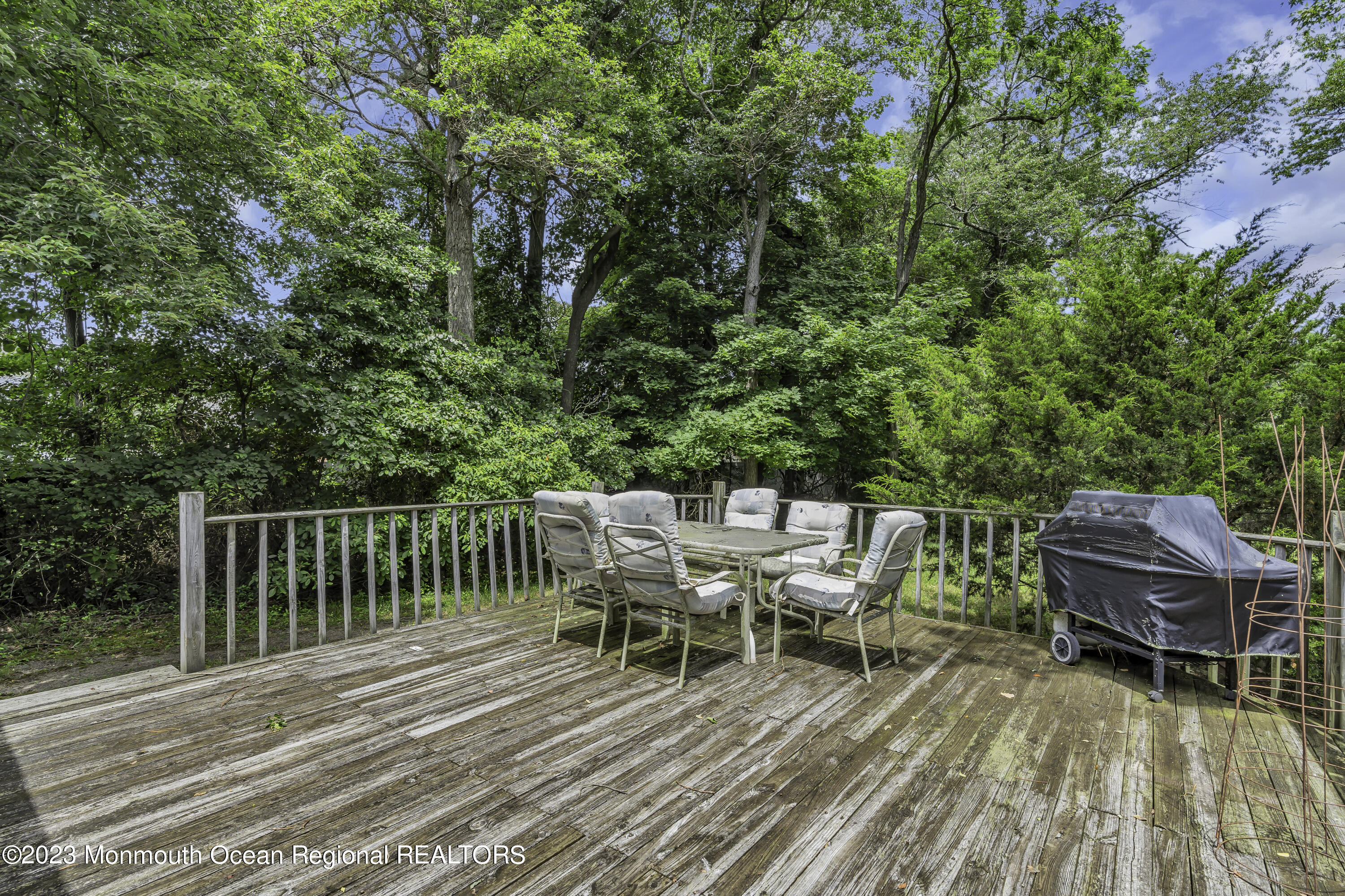 388 Cherry Quay Road Brick, NJ 08723 - Photo 29 of 35 a view of a chairs and table on the wooden floor