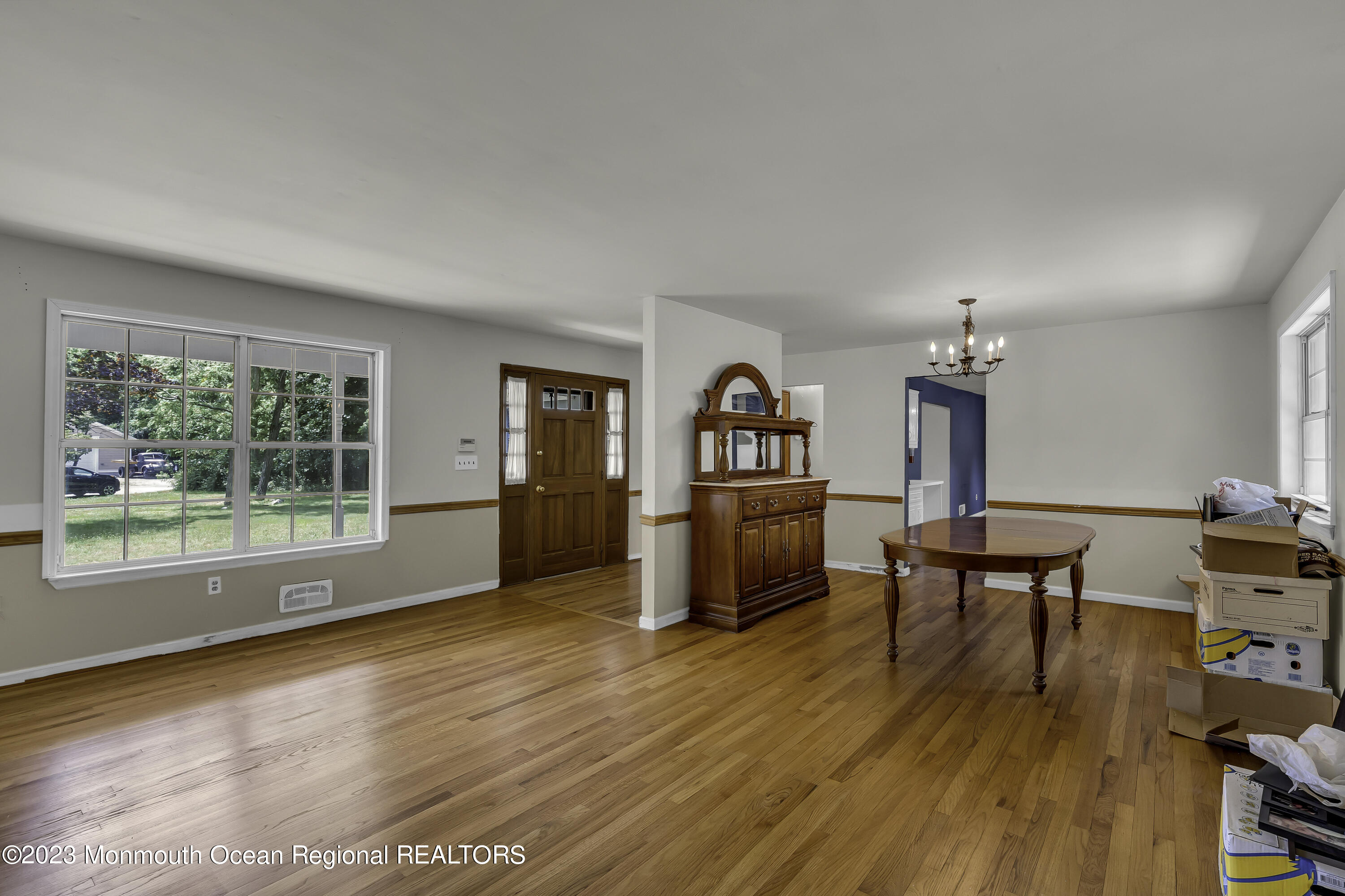 388 Cherry Quay Road Brick, NJ 08723 - Photo 5 of 35 a living room with furniture and a wooden floor