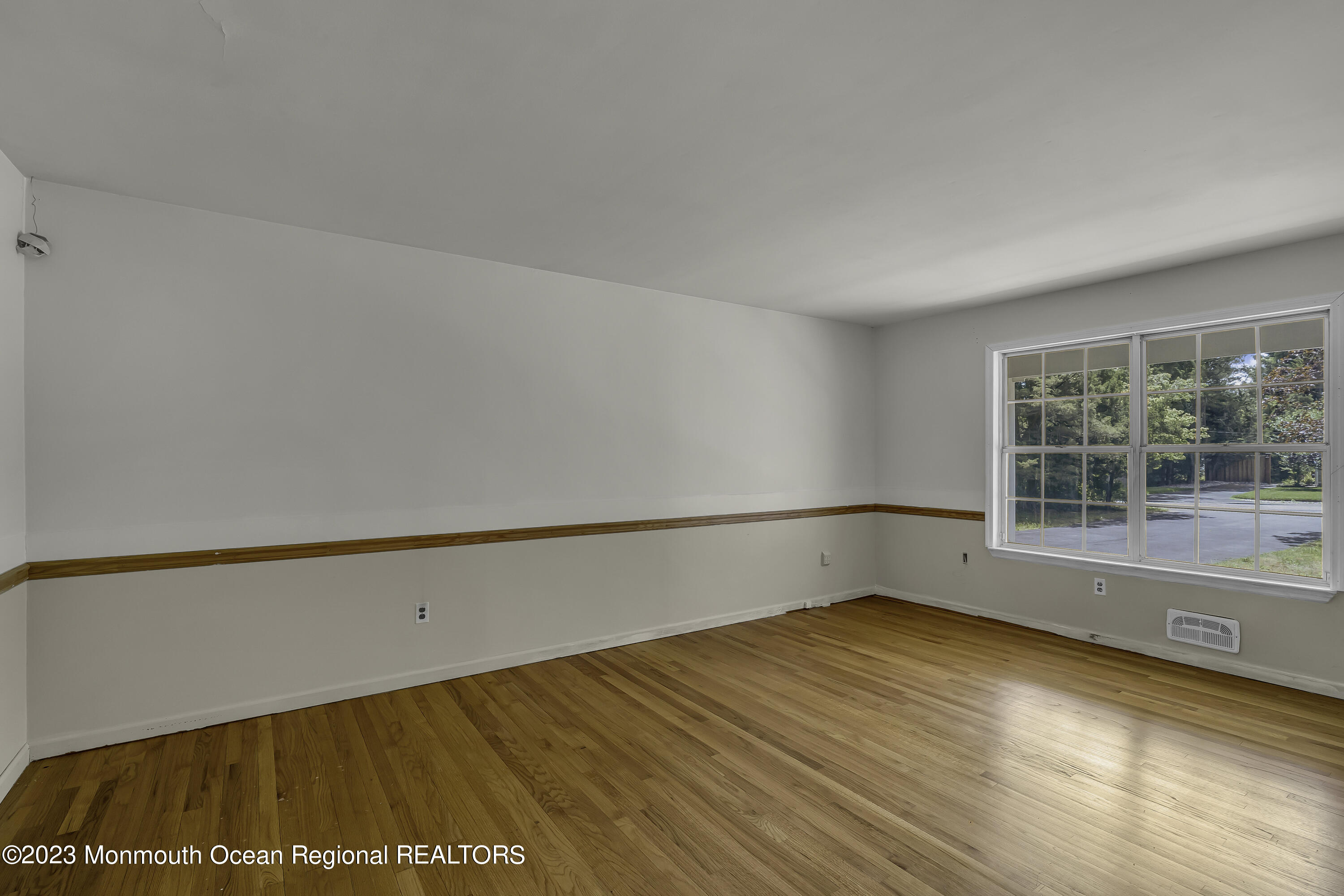 388 Cherry Quay Road Brick, NJ 08723 - Photo 6 of 35 a view of an empty room with a window