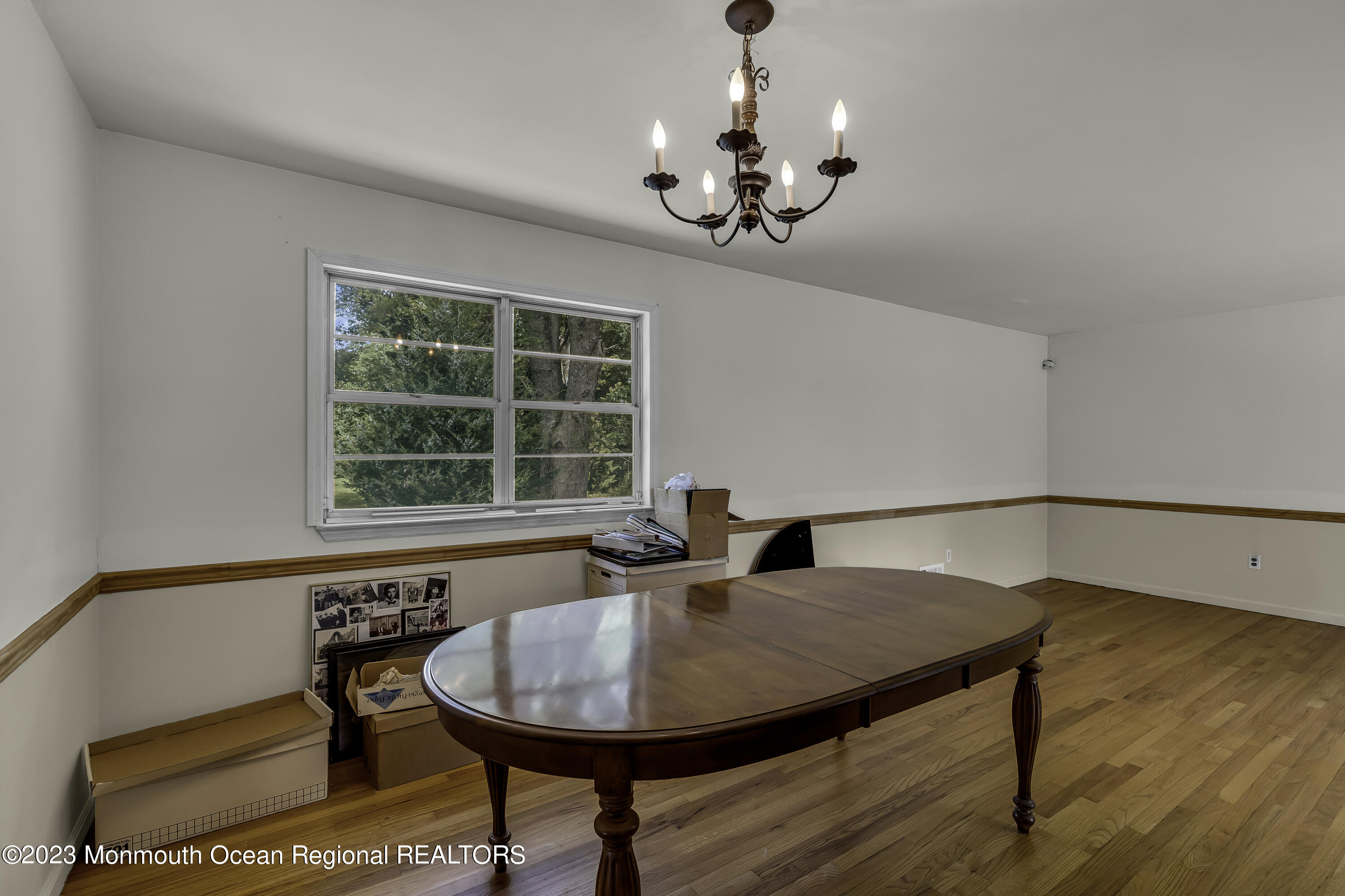 388 Cherry Quay Road Brick, NJ 08723 - Photo 8 of 35 a view of a dining room with furniture and wooden floor