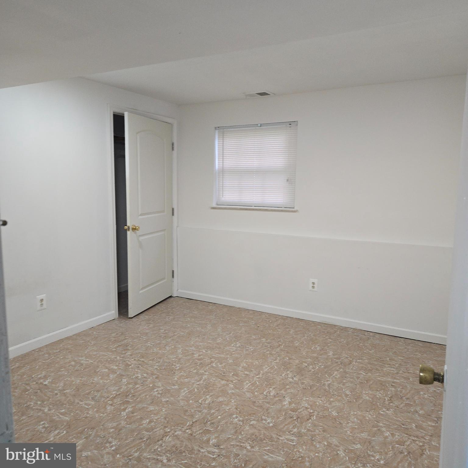3505 Templar Road Randallstown, MD 21133 - Photo 27 of 40 an empty room with a natural light