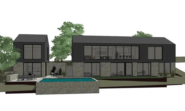 a view of swimming pool with a yard