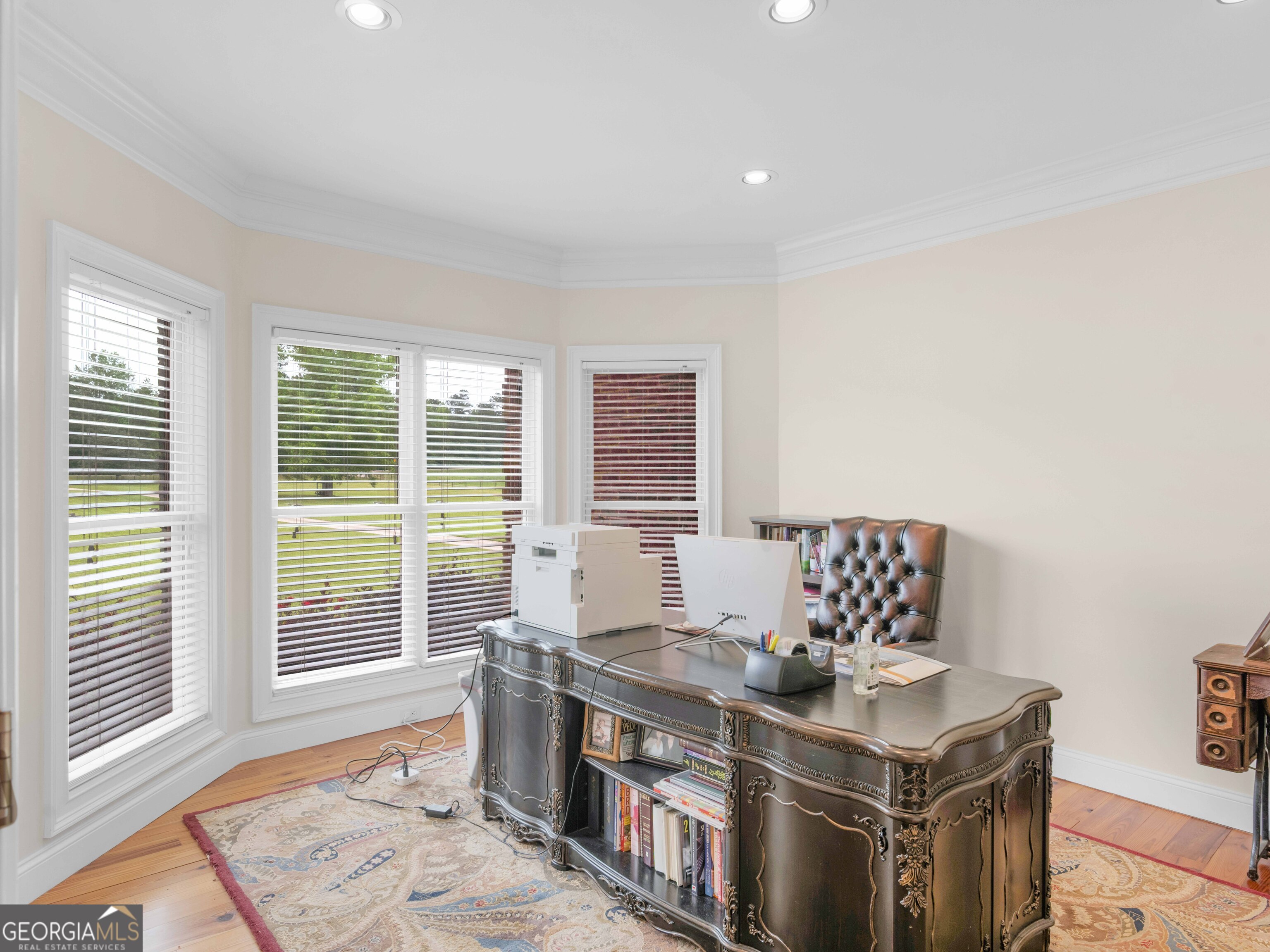 4101 West Ellis Road Griffin, GA 30223 - Photo 28 of 100 a view of a kitchen with stainless steel appliances granite countertop a sink and a stove