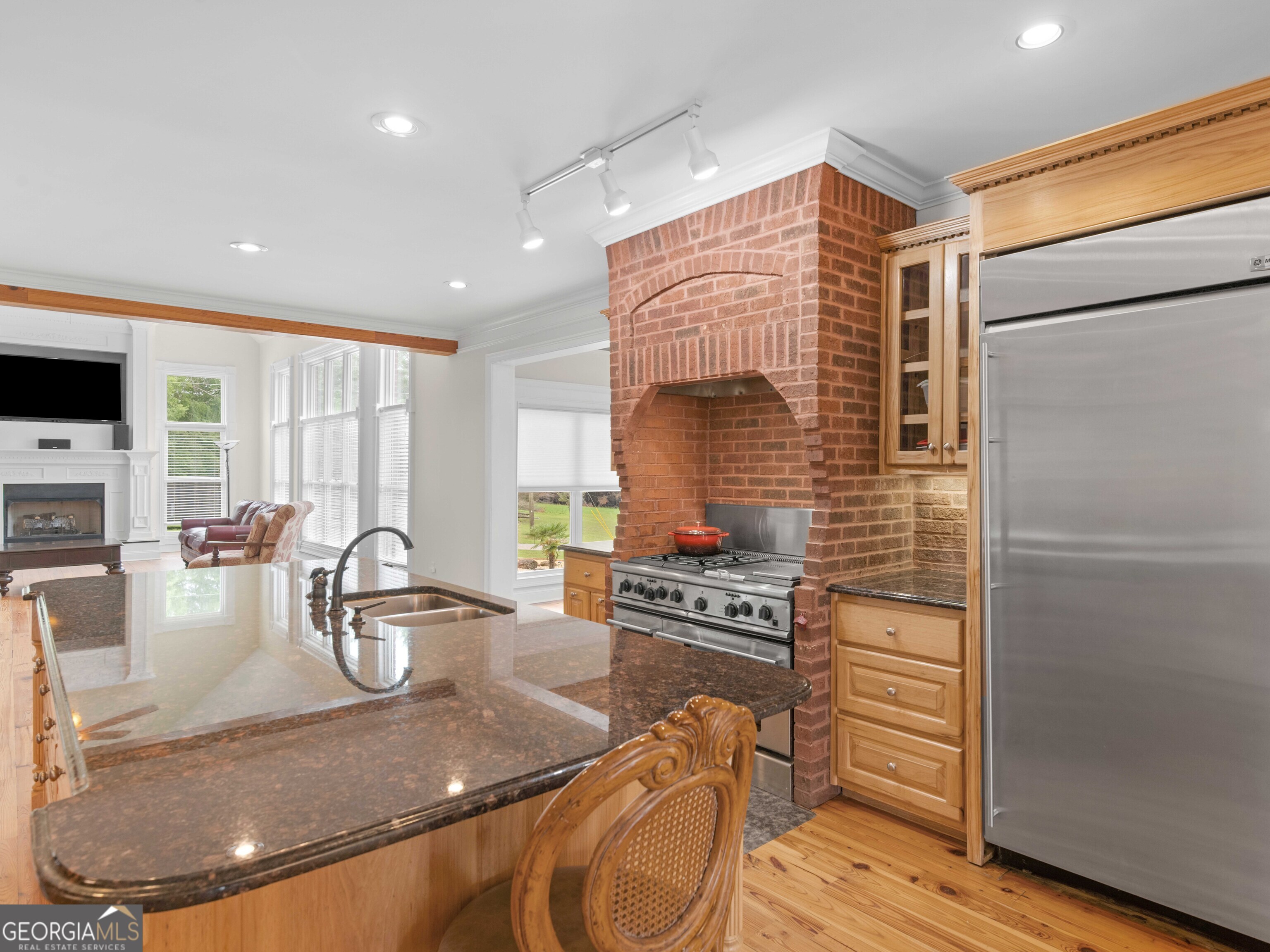 4101 West Ellis Road Griffin, GA 30223 - Photo 34 of 100 a kitchen with stainless steel appliances granite countertop a sink and a refrigerator