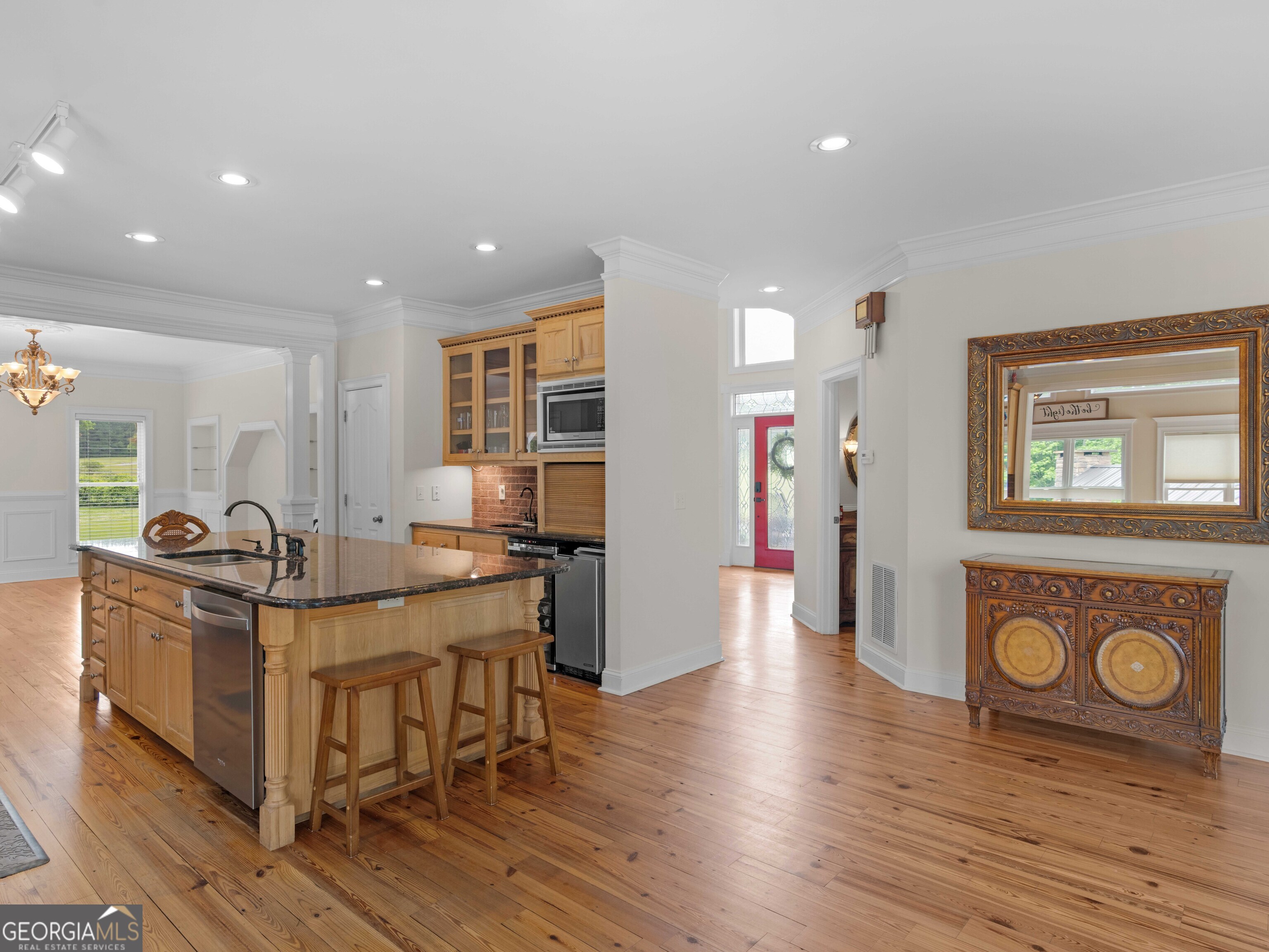4101 West Ellis Road Griffin, GA 30223 - Photo 42 of 100 a kitchen with stainless steel appliances granite countertop a stove and a refrigerator