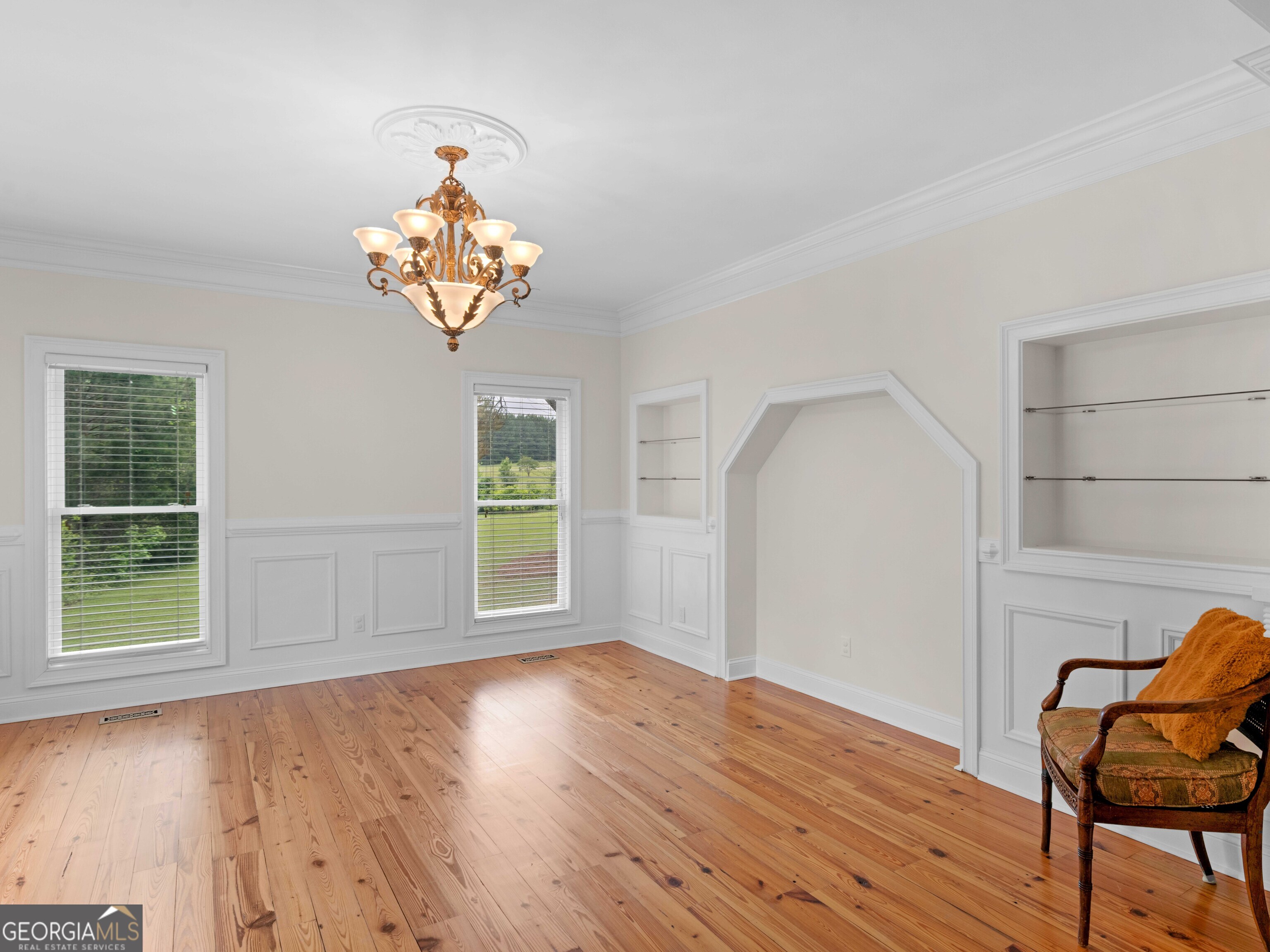 4101 West Ellis Road Griffin, GA 30223 - Photo 46 of 100 a view of a room with wooden floor lounge chair and windows