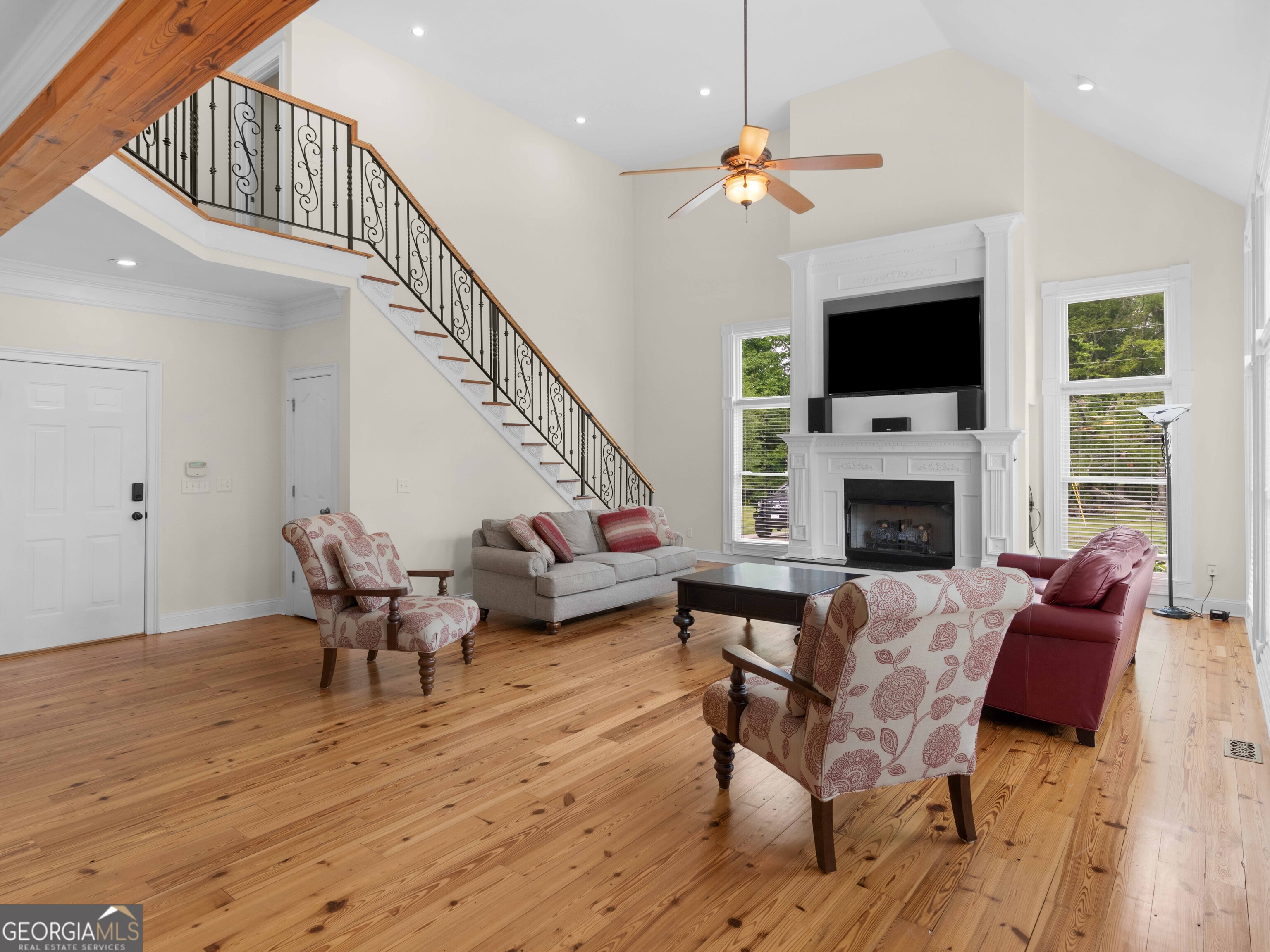 4101 West Ellis Road Griffin, GA 30223 - Photo 53 of 100 a living room with furniture fireplace and a flat screen tv