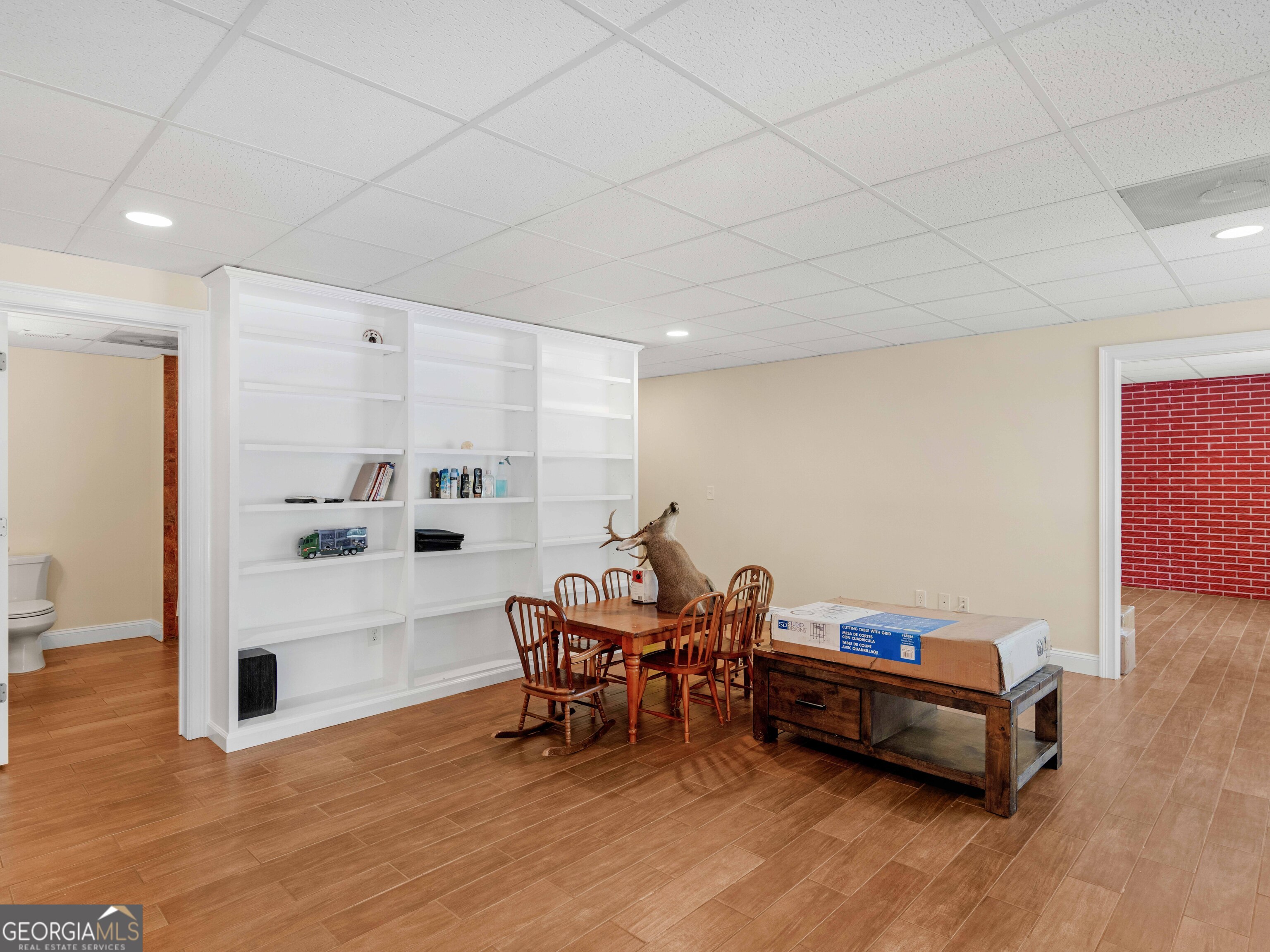 4101 West Ellis Road Griffin, GA 30223 - Photo 88 of 100 a living room with furniture and wooden floor
