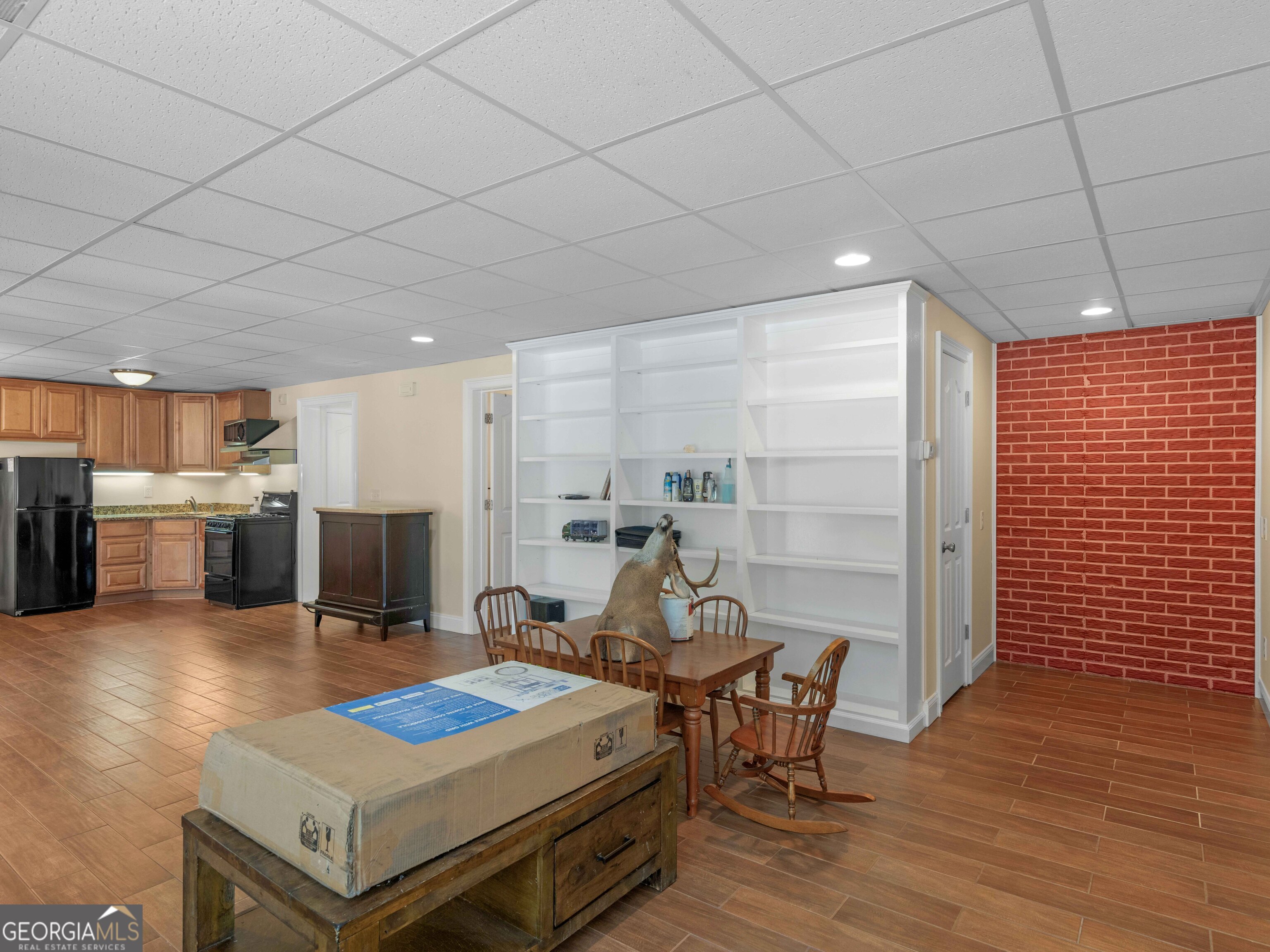 4101 West Ellis Road Griffin, GA 30223 - Photo 89 of 100 a living room with stainless steel appliances kitchen island granite countertop furniture and a kitchen view