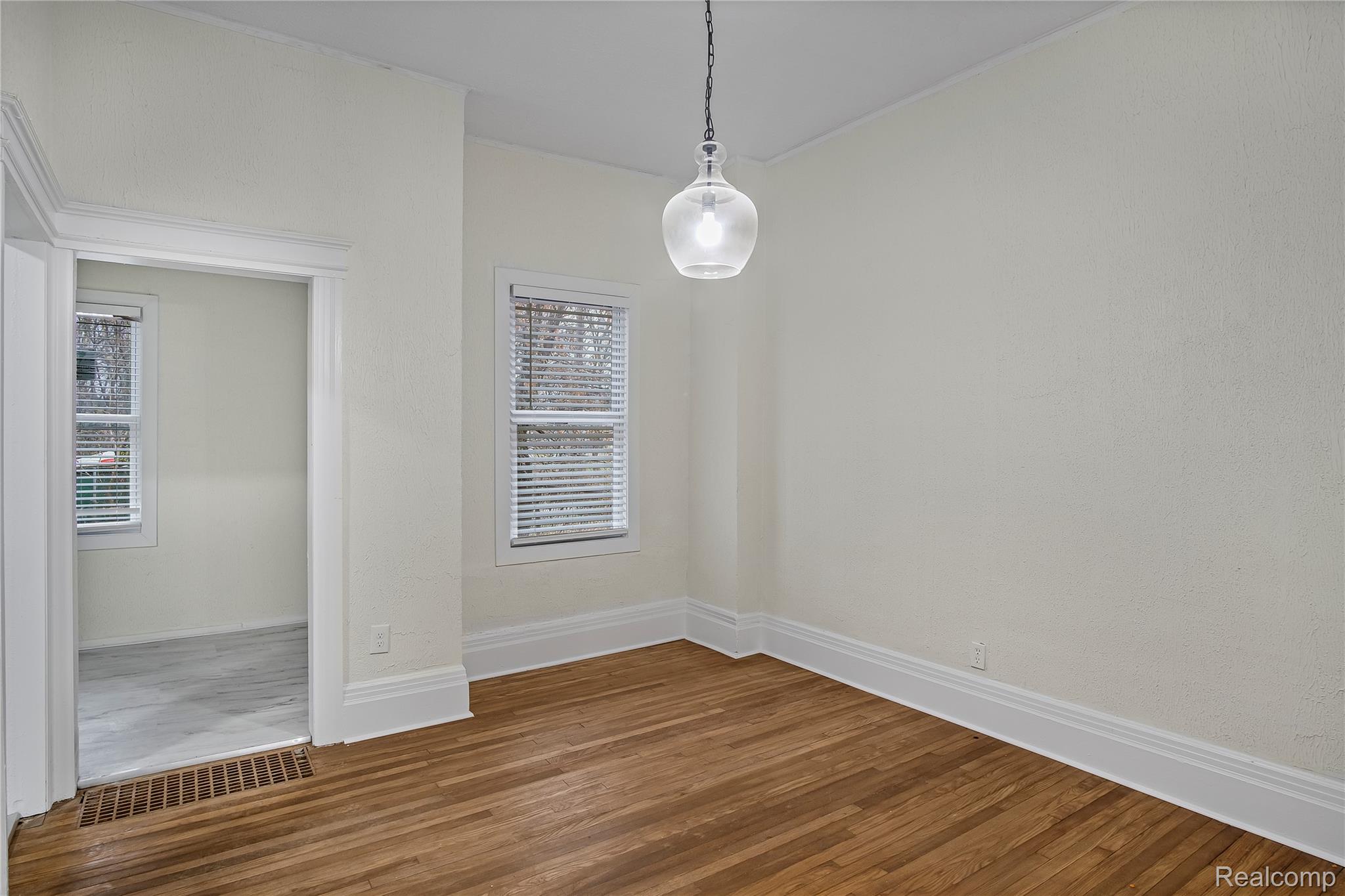 427 Melbourne Street Detroit, MI 48202 - Photo 15 of 29 Unfurnished dining area with wood finished floors