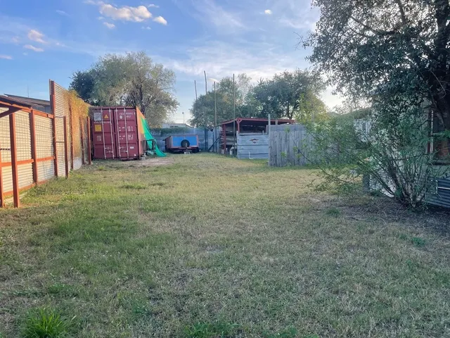 a fire hydrant in the middle of a field