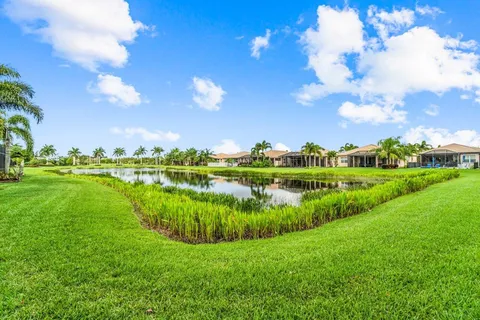 a view of a lake with a big yard