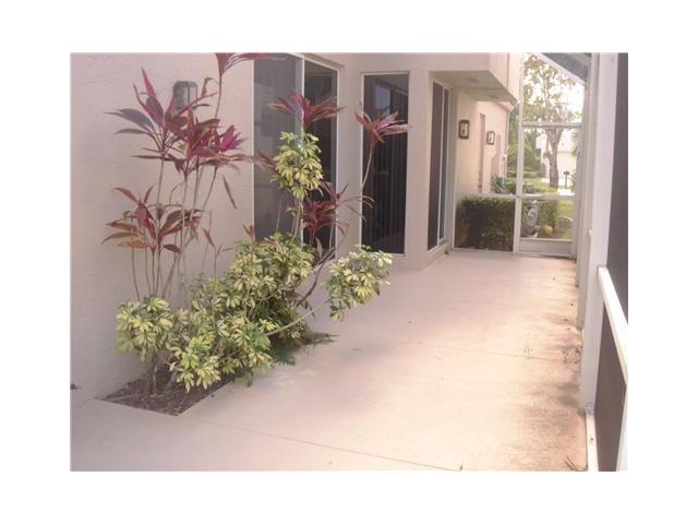 17196 Newport Club Drive Boca Raton, FL 33496 - Photo 13 of 22 Wrap around patio from kitchen to master