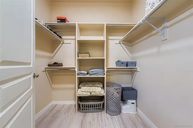 a storage room with washer and dryer