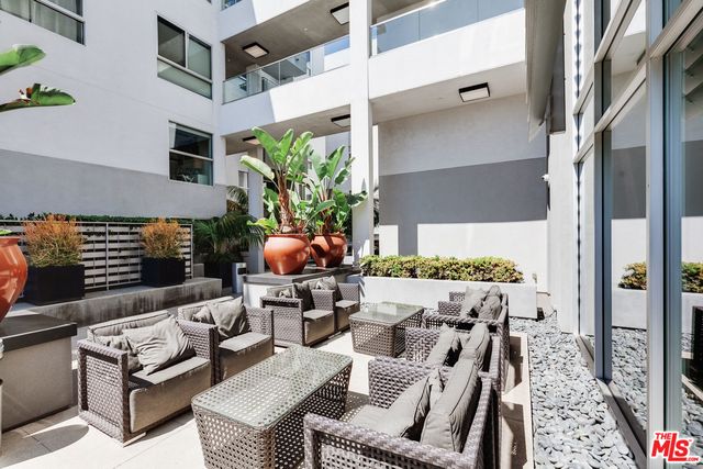a view of potted plant in front of a door