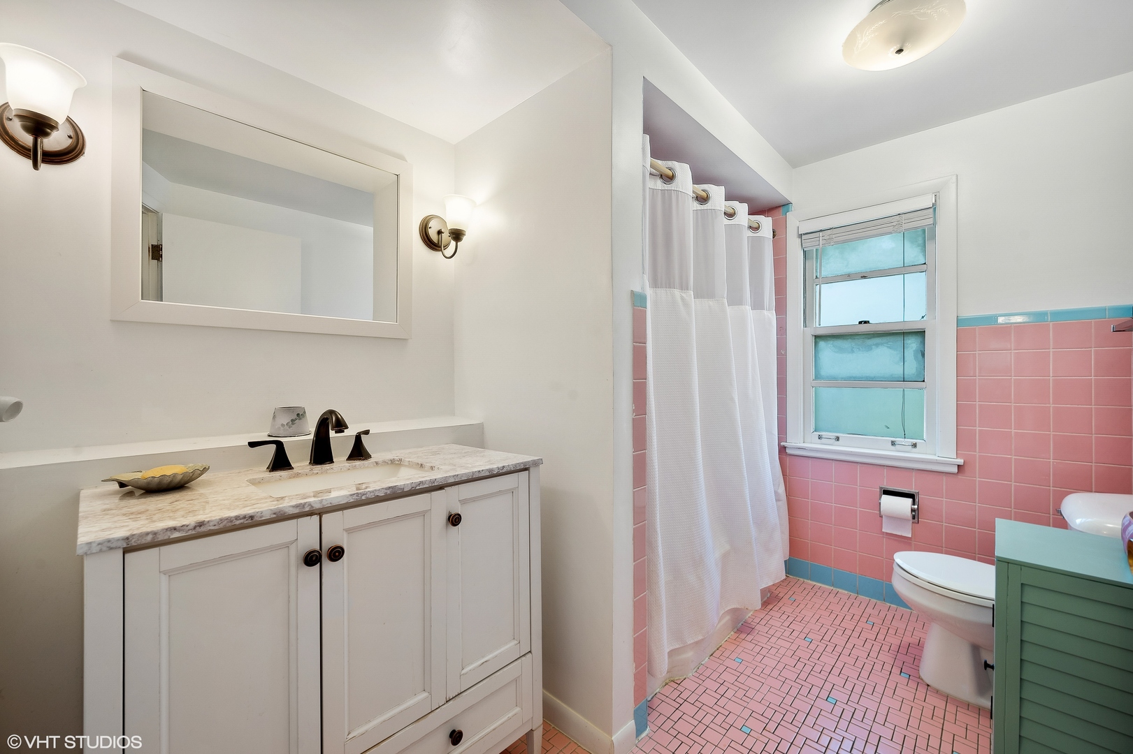 1544 Longvalley Road Glenview, IL 60025 - Photo 15 of 25 a bathroom with a sink a toilet a mirror and vanity