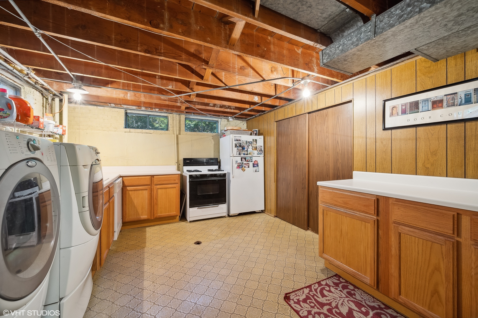 1544 Longvalley Road Glenview, IL 60025 - Photo 18 of 25 a view of a storage & utility room with washer and dryer