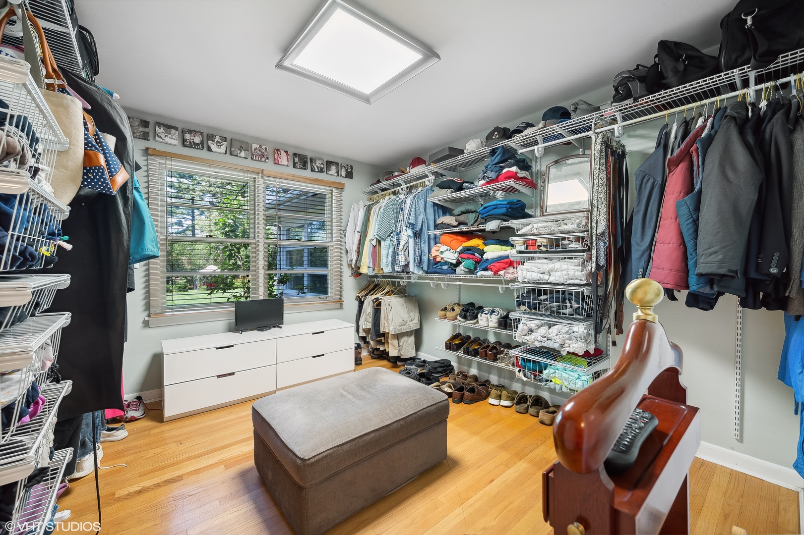 1544 Longvalley Road Glenview, IL 60025 - Photo 9 of 25 a view of walk in closet with clothes and shoes