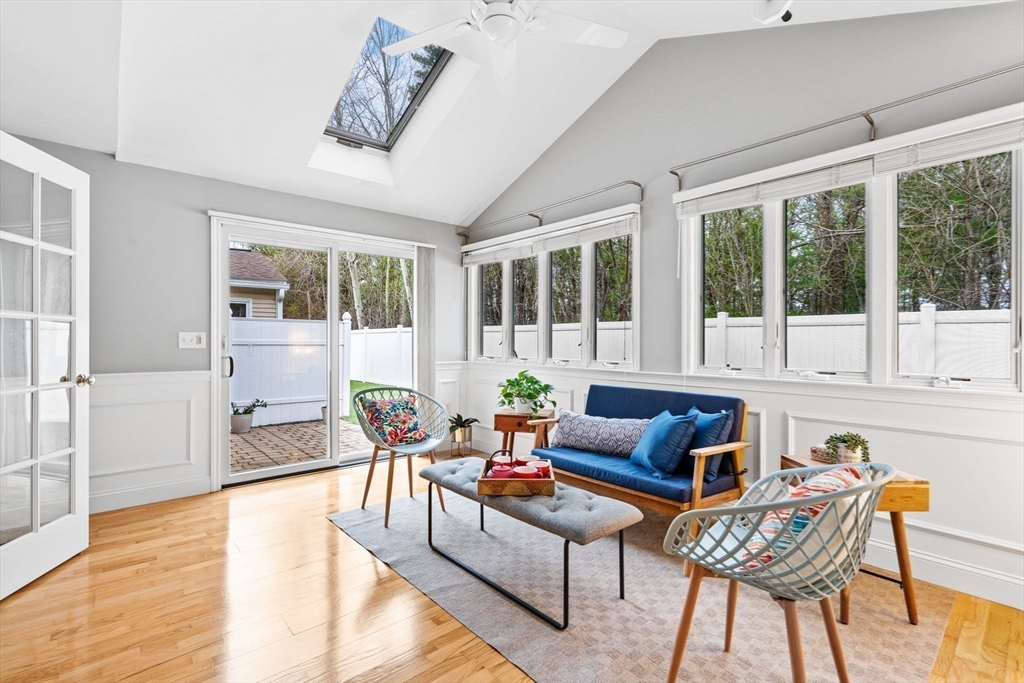 216 Rangeway Road, Unit 182 Billerica, MA 01862 - Photo 14 of 42 a living room with furniture and floor to ceiling windows