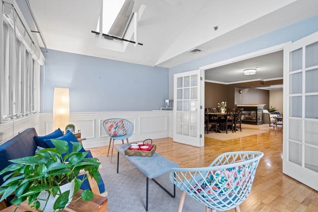 216 Rangeway Road, Unit 182 Billerica, MA 01862 - Photo 15 of 42 a living room with furniture and a potted plant