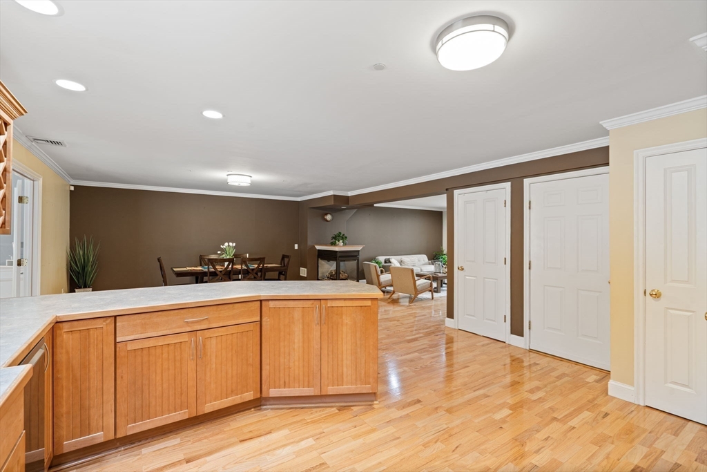 216 Rangeway Road, Unit 182 Billerica, MA 01862 - Photo 19 of 42 a view of a kitchen with a sink stainless steel appliances and cabinets