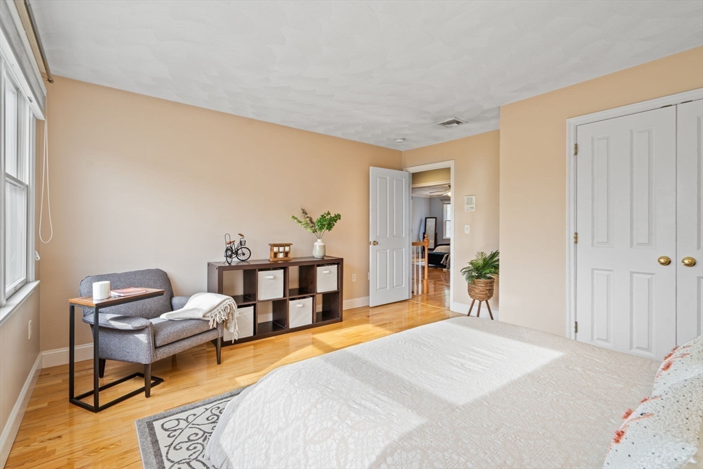216 Rangeway Road, Unit 182 Billerica, MA 01862 - Photo 29 of 42 a bedroom with furniture and a rug