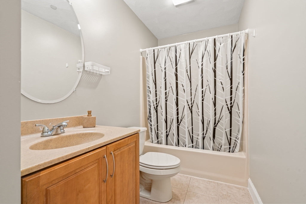 216 Rangeway Road, Unit 182 Billerica, MA 01862 - Photo 30 of 42 a bathroom with a sink a toilet and shower