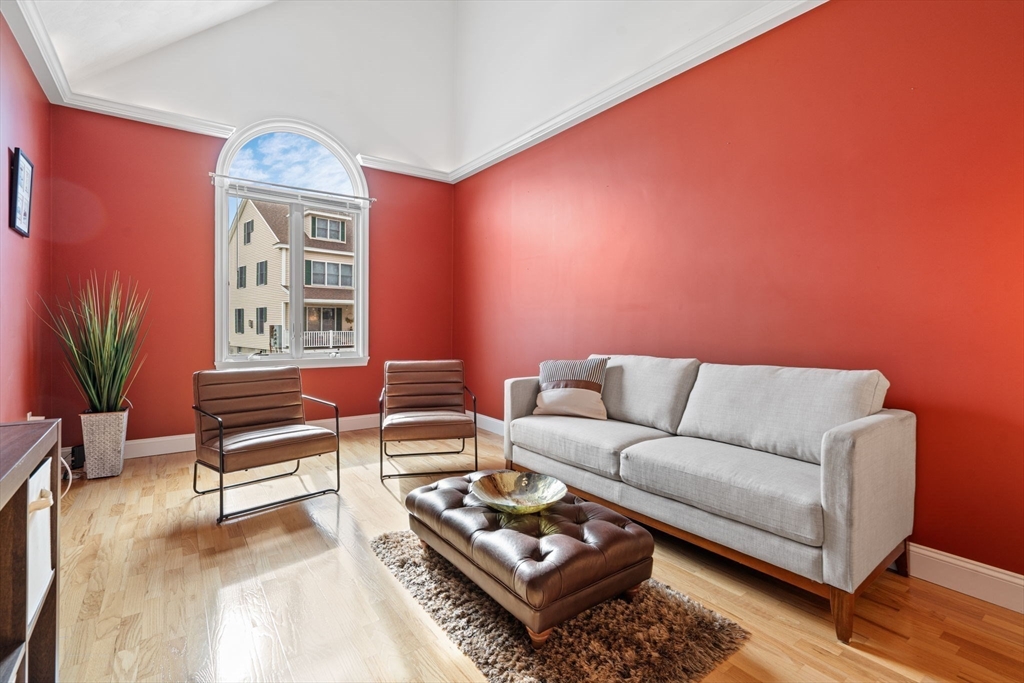 216 Rangeway Road, Unit 182 Billerica, MA 01862 - Photo 31 of 42 a living room with furniture a rug and a window