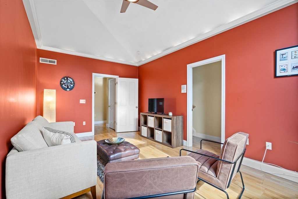 216 Rangeway Road, Unit 182 Billerica, MA 01862 - Photo 32 of 42 a living room with furniture and a table