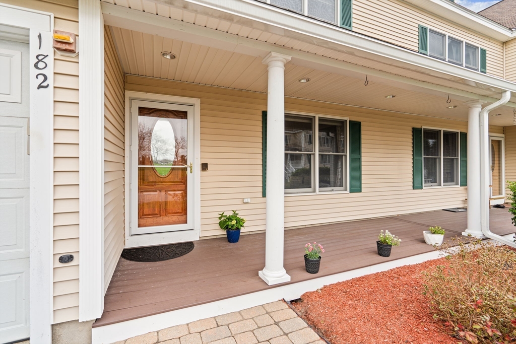 216 Rangeway Road, Unit 182 Billerica, MA 01862 - Photo 4 of 42 a front view of a house with a yard