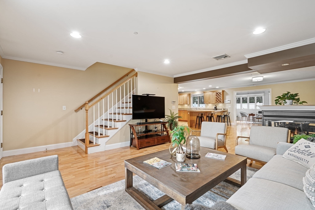 216 Rangeway Road, Unit 182 Billerica, MA 01862 - Photo 8 of 42 a living room with furniture and a flat screen tv