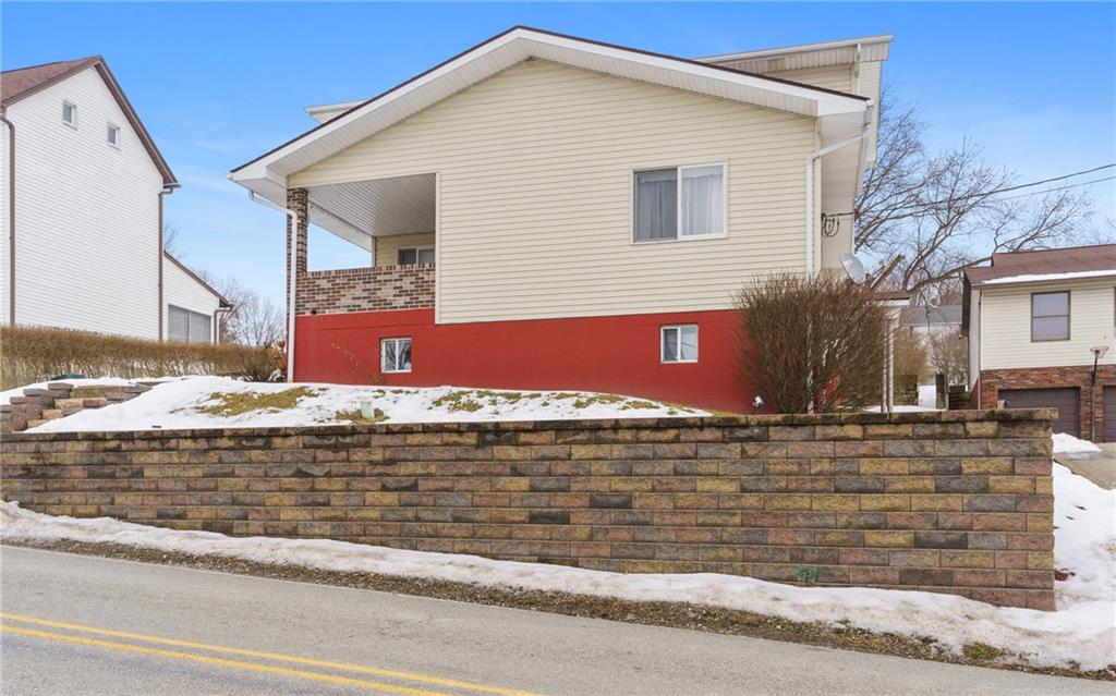 2116 Claridge Elliott Road Claridge, PA 15623 - Photo 1 of 25 a view of a house with a patio