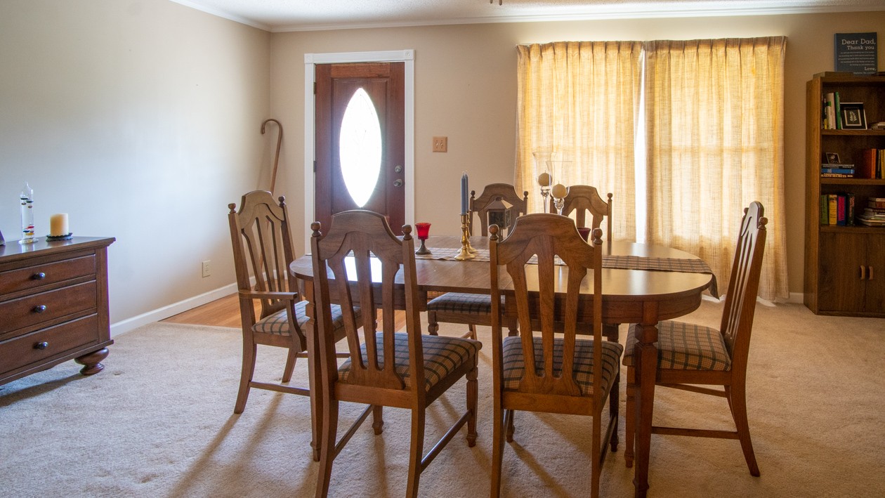 27085 Bethel Road Elkmont, AL 35620 - Photo 28 of 45 a view of a dining room with furniture and a window