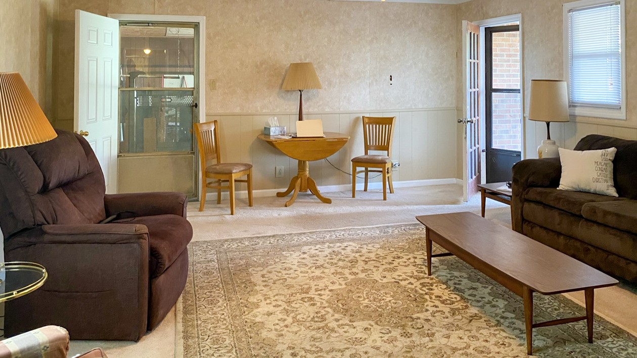 27085 Bethel Road Elkmont, AL 35620 - Photo 33 of 45 a living room with furniture and a couch