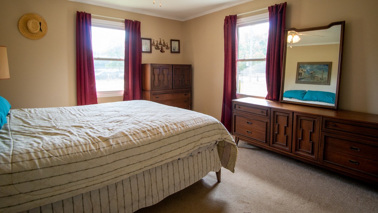 27085 Bethel Road Elkmont, AL 35620 - Photo 38 of 45 a bedroom with a bed and a window