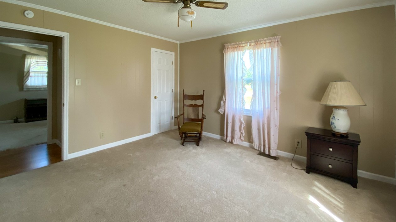 27085 Bethel Road Elkmont, AL 35620 - Photo 39 of 45 wooden floor and window in a room