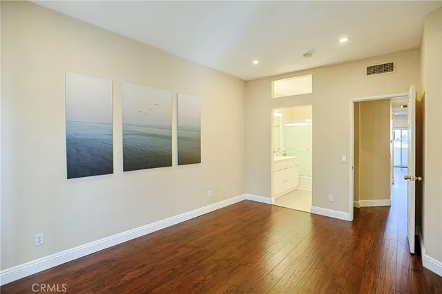 a bathroom with a double vanity sink mirror and shower