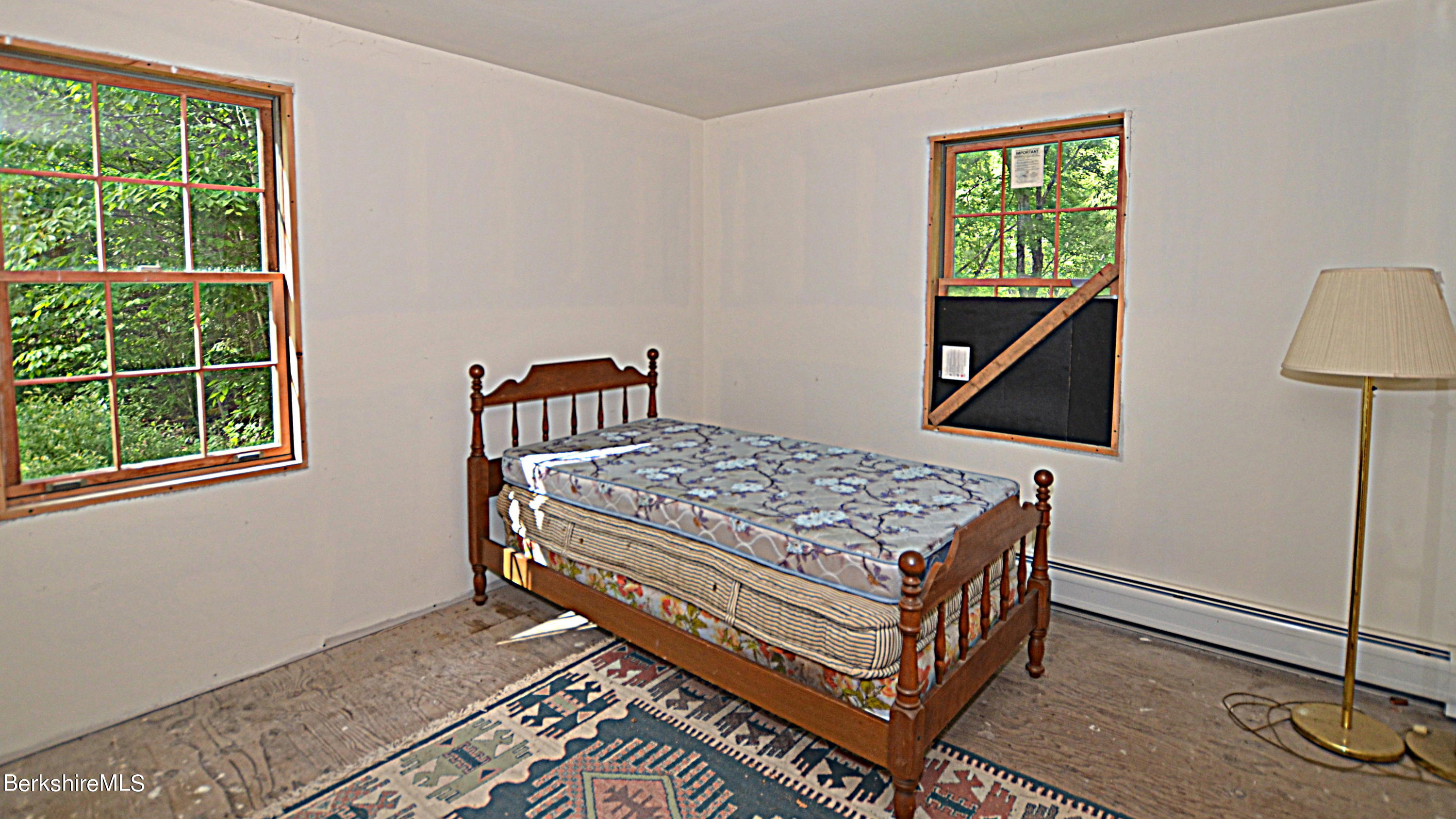 80 Town Hill Road Middlefield, MA 01011 - Photo 15 of 44 a room with a bed and a window