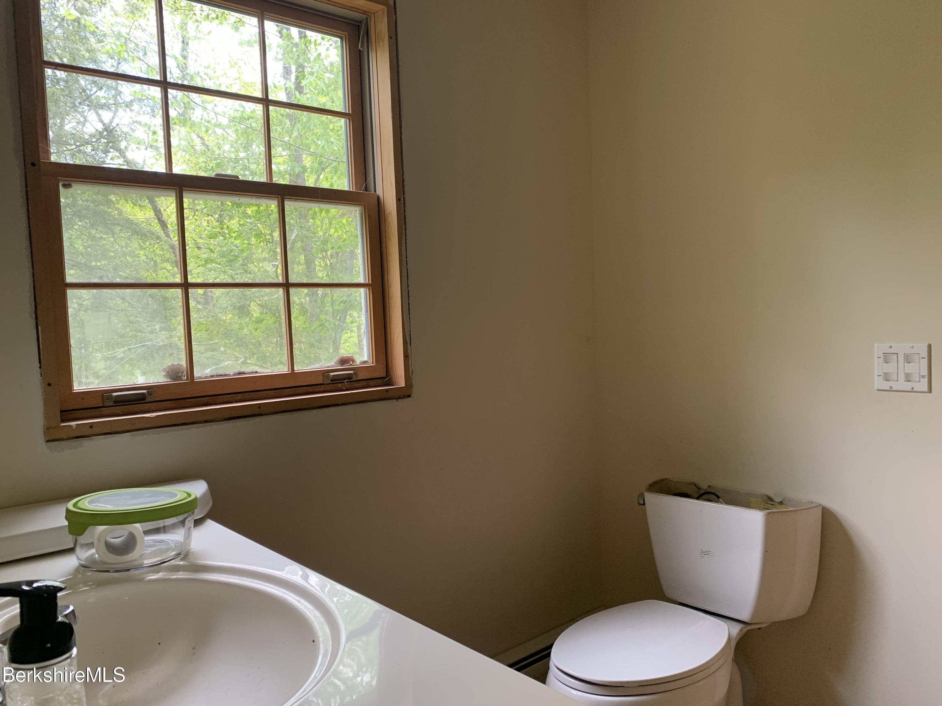 80 Town Hill Road Middlefield, MA 01011 - Photo 18 of 44 a bathroom with a sink and a toilet